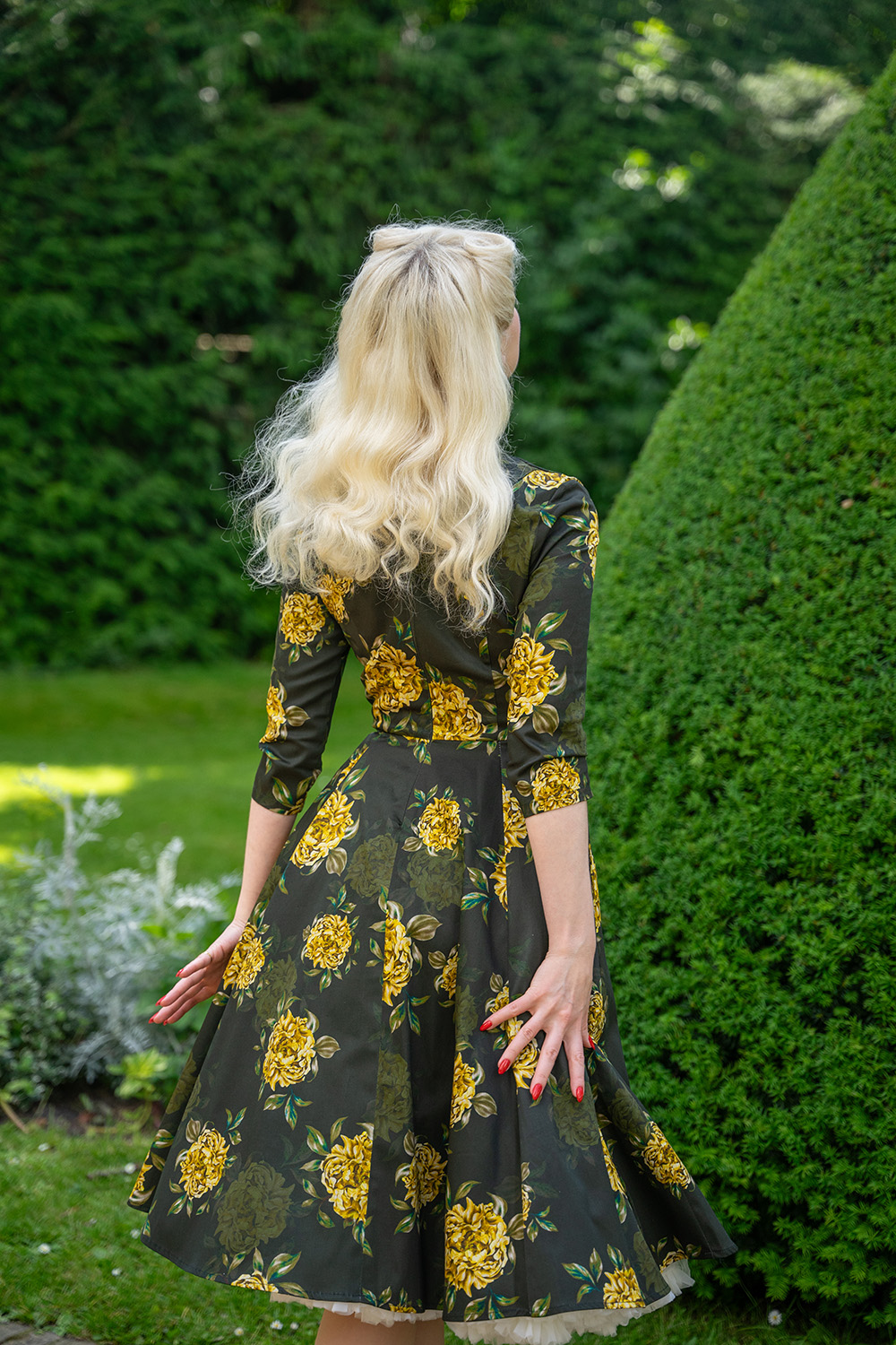 black dress with yellow roses Inez Floral Swing Dress in Yellow